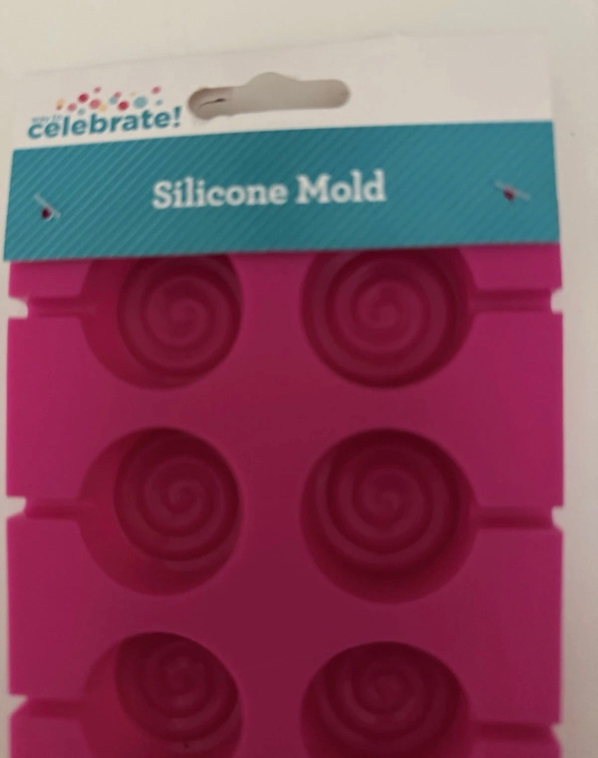 El molde de silicona Way To Celebrate con 10 cavidades para piruletas en espiral es divertido para fiestas