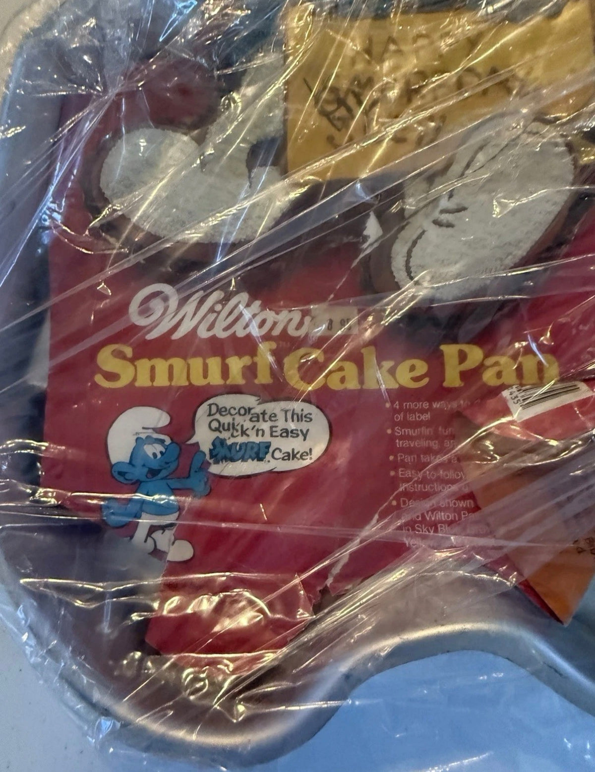 El molde para pastel de los Pitufos Wilton Vintage 1983