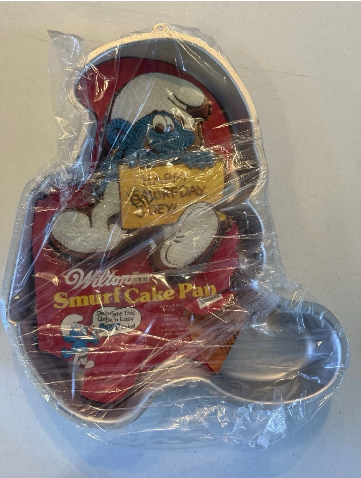 El molde para pastel de los Pitufos Wilton Vintage 1983